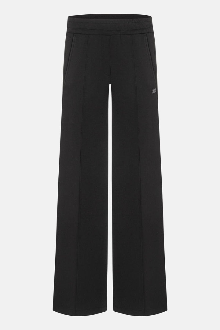 Pantalon à bandes latérales Amelia avec design moderne, bandes contrastantes, taille élastique et logo CAMBIO, couleur noire.