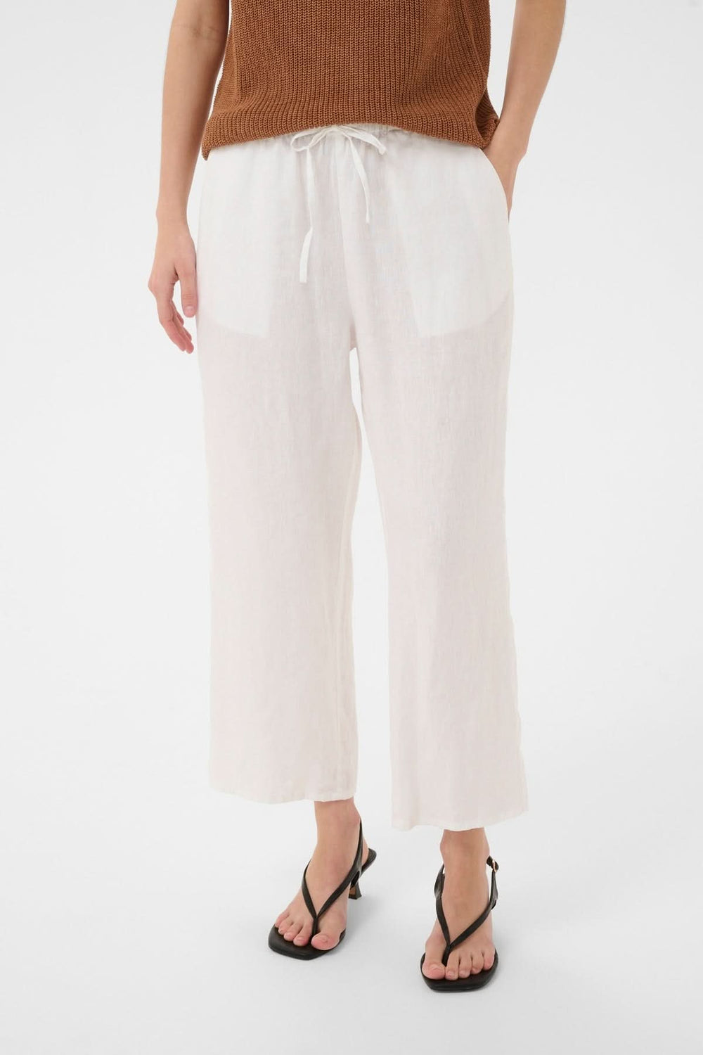 Pantalon de lin Berita fluide à jambe droite, taille élastique avec cordon, poches latérales, tissu léger, idéal pour l'été.