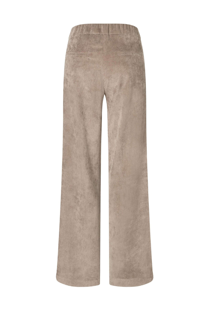 Pantalon en velours côtelé beige à jambe large, taille élastique, poches latérales pour un style rétro chic.