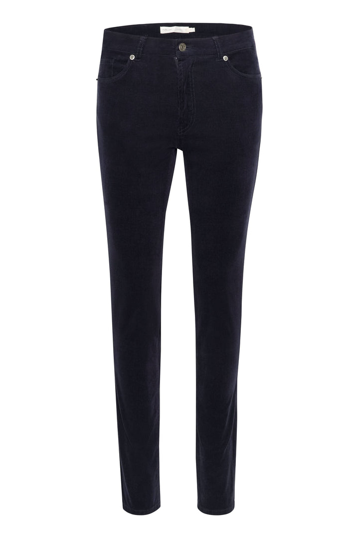 Pantalon en velours bleu marine, coupe ajustée, idéal pour une tenue chic en automne et hiver.