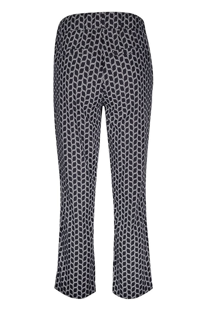 Pantalon fluide imprimé avec motif graphique, coupe droite légèrement évasée, taille élastique, vue arrière.