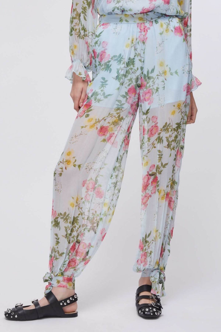 Pantalon fluide à imprimé floral avec jambe ample et ourlets noués, tissu léger idéal pour l&