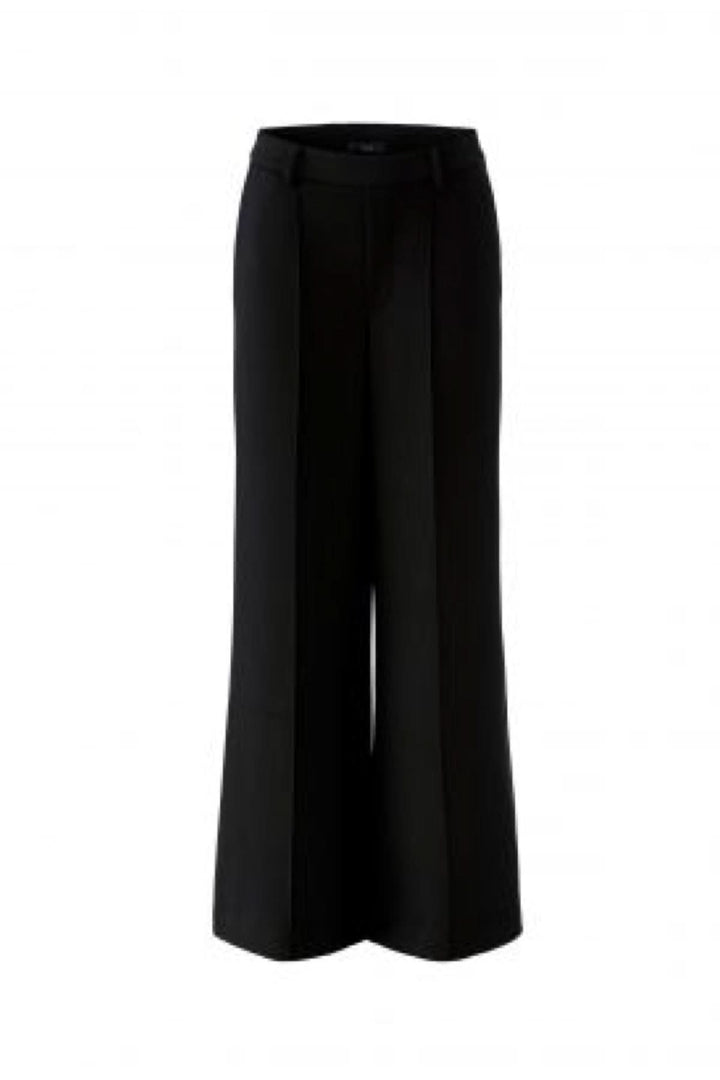 Pantalon large effet cuir avec coupe fluide et poches arrière, pour un look audacieux et sophistiqué de jour comme de soir.