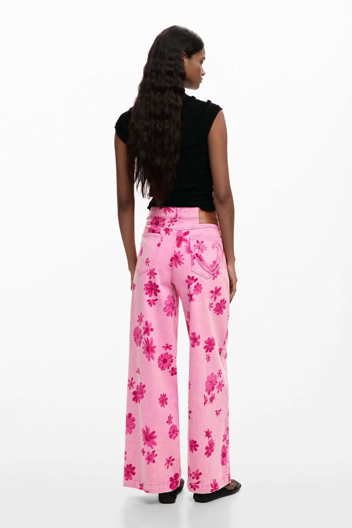 Pantalon large à imprimé floral, coupe fluide féminine, vue de dos, parfait avec haut ajusté ou décontracté.