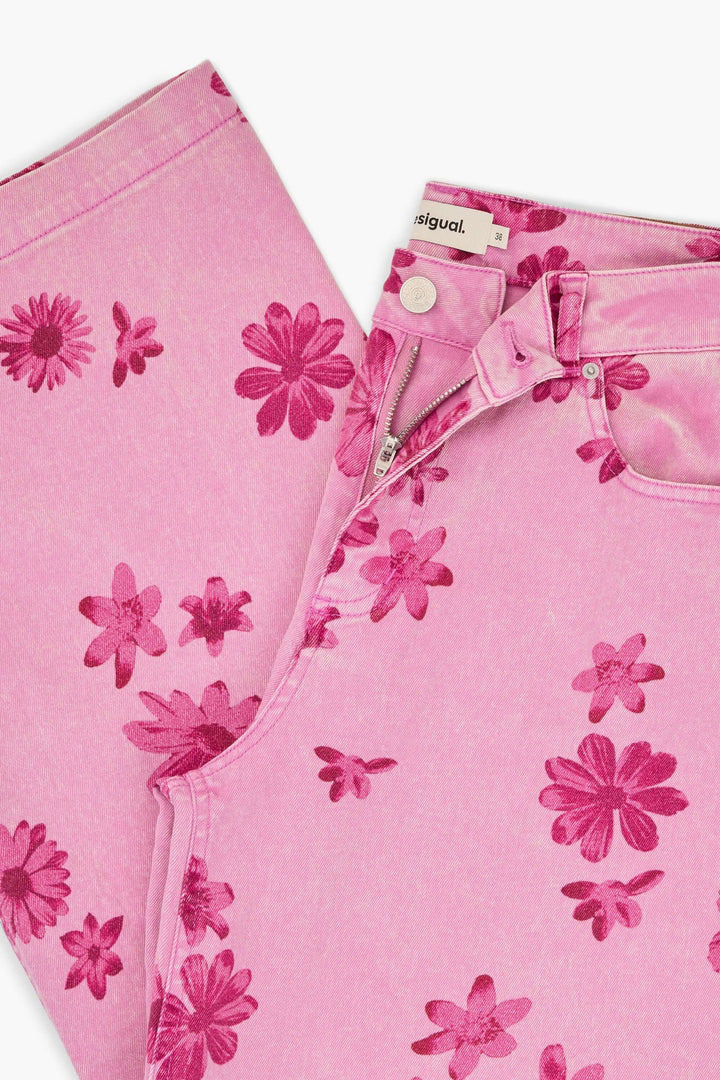 Pantalon large à imprimé floral rose avec fermeture et motif audacieux.
