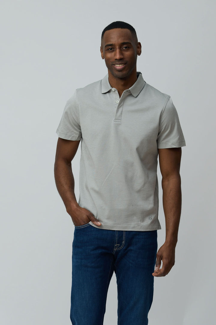 Polo en coton Corneliani à maille fine, coupe ajustée, col classique.