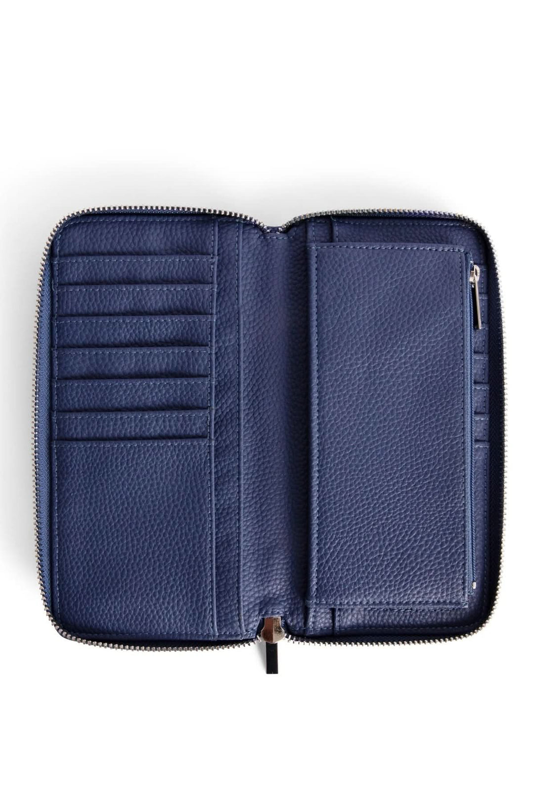 Intérieur d'un portefeuille zippé en cuir texturé, avec fentes pour cartes et compartiment pour billets.