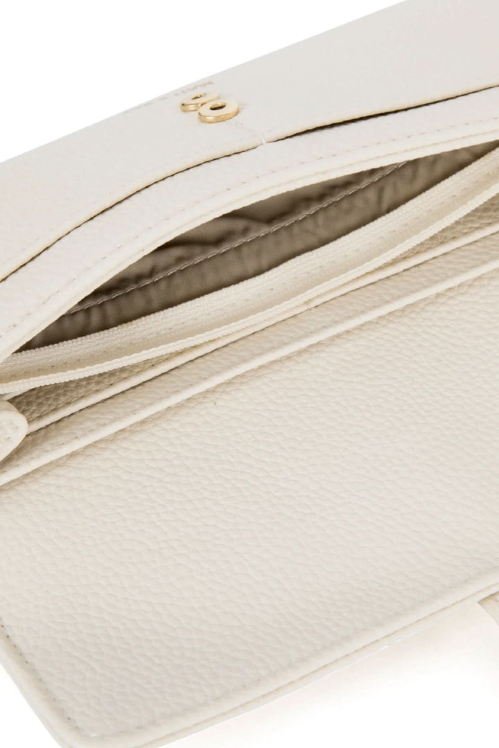 Intérieur du portefeuille Seun, montrant plusieurs fentes pour cartes et une grande poche zippée, couleur blanc.