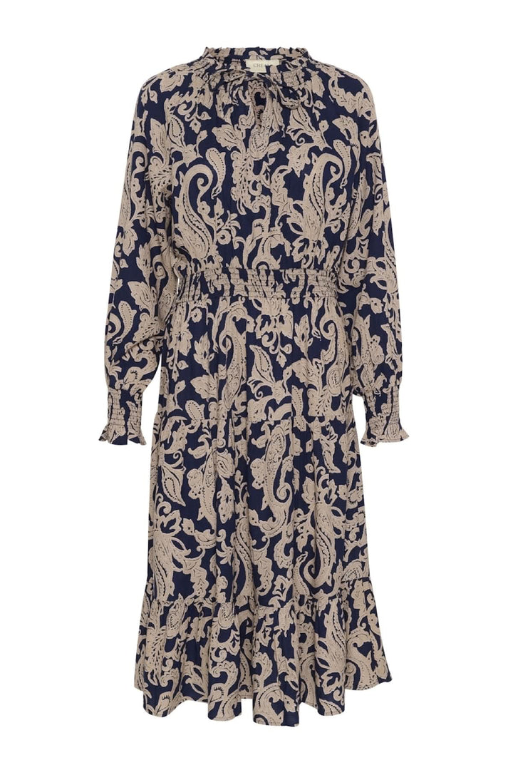 Robe Lucy longue bleu marine avec motif beige, encolure goutte et manches longues élastiquées.
