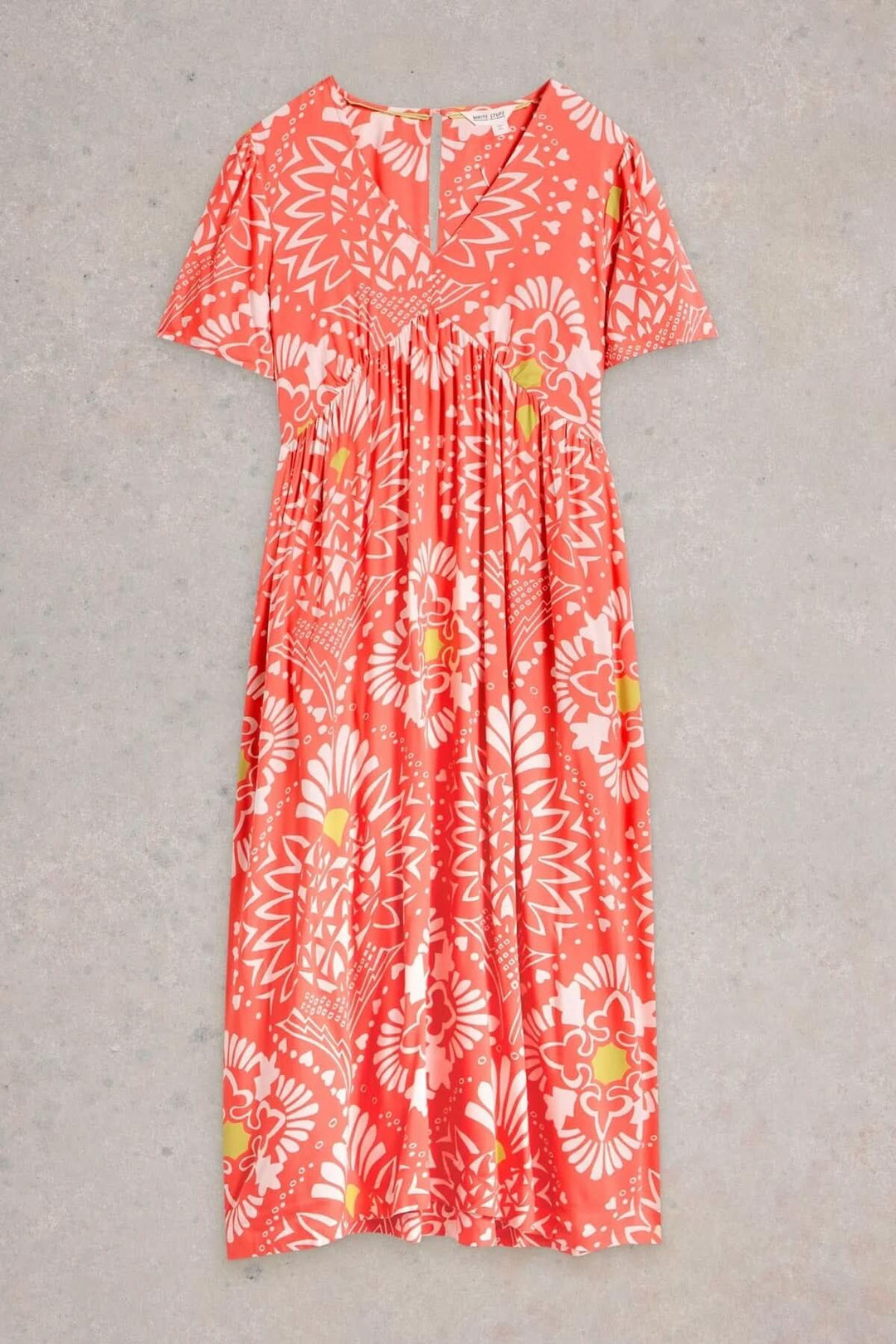 Robe Lucy, robe midi à imprimé floral audacieux, encolure en V et coupe fluide, idéale pour un look estival.
