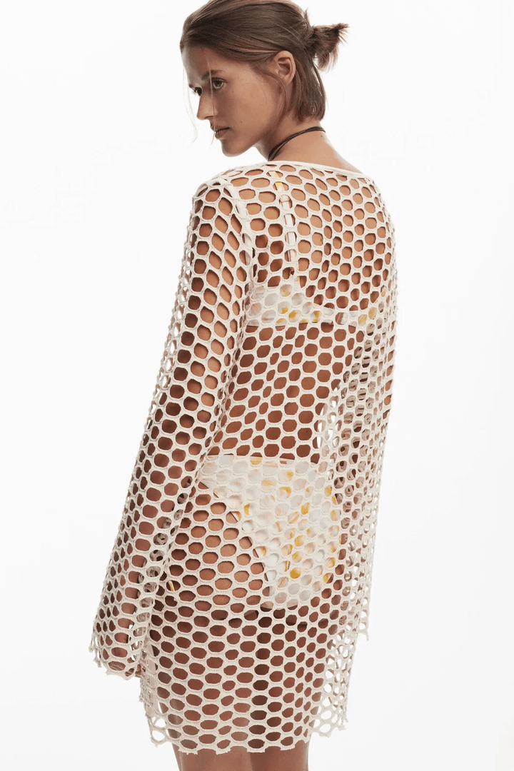Robe de plage en crochet ajouré, légère et bohème, idéale pour sublimer un maillot de bain.