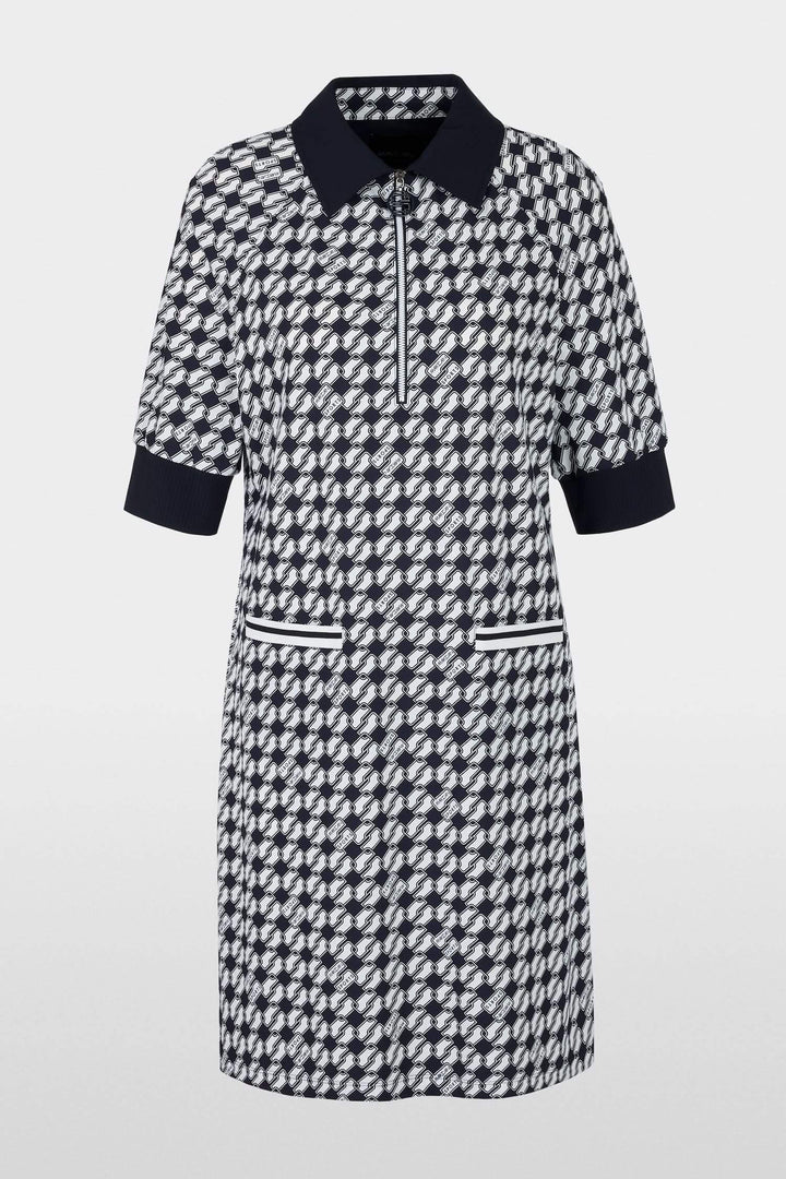 Robe courte en jersey scuba, imprimé géométrique, col classique, poches plaquées et fermeture éclair.