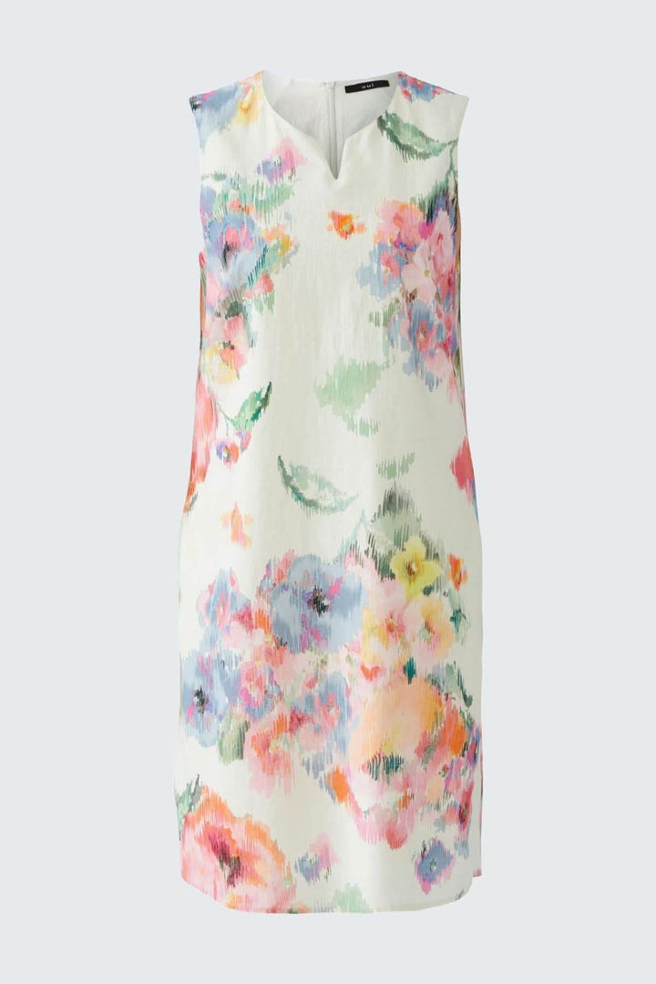 Robe féminine imprimée floral en aquarelle, coupe en A, en lin et coton, élégante et estivale.