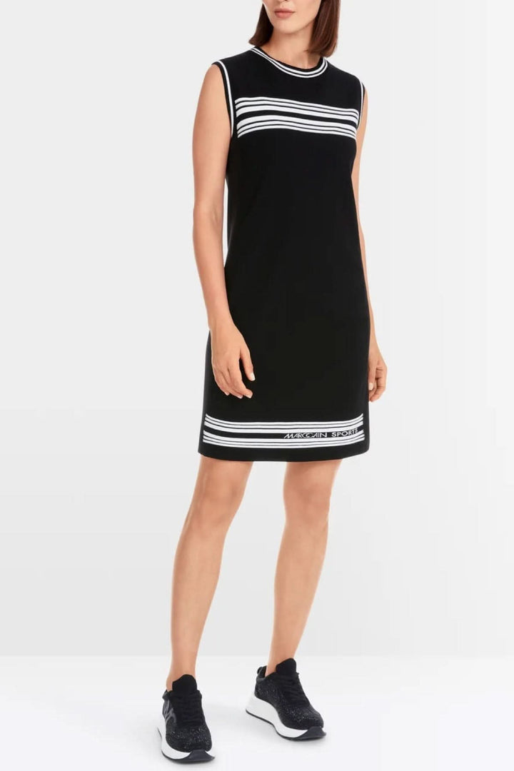 A black sleeveless A-line dress featuring striped borders, made from responsible materials and sustainably produced.