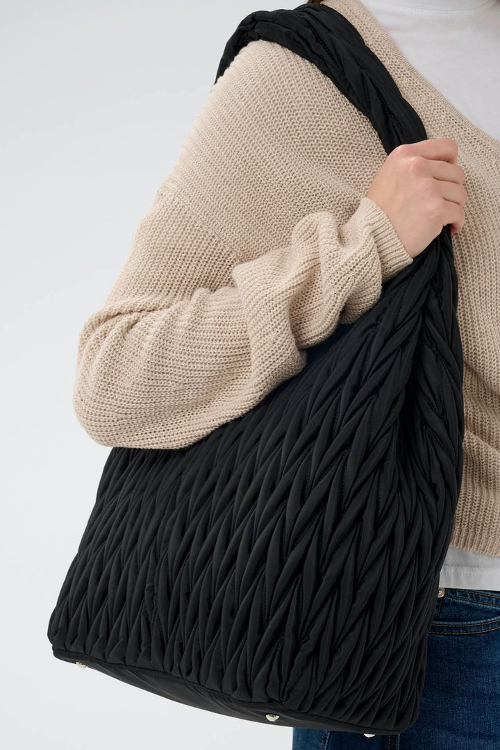 Sac fourre-tout matelassé Samy porté à l&