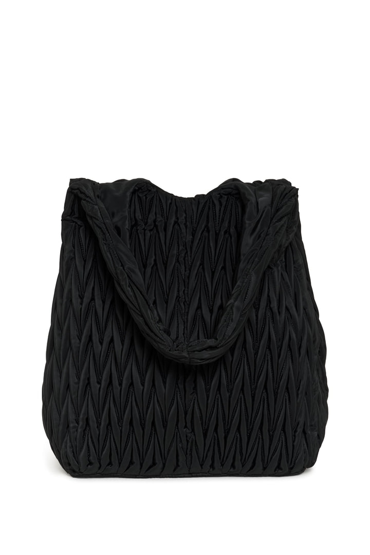 Sac fourre-tout matelassé Samy noir avec texture distincte et anses souples, idéal pour usage urbain ou professionnel.