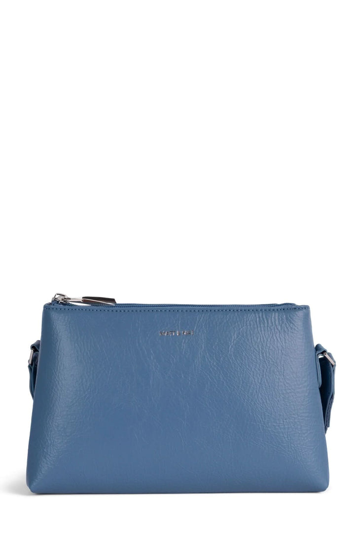 Sac à mains Indie bleu, compact avec poche zippée et bretelle ajustable, parfait pour un usage quotidien.