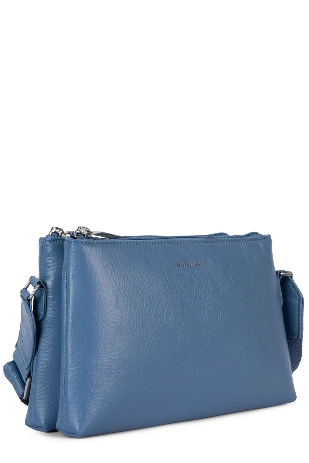 Sac à mains Indie en cuir bleu, avec deux compartiments zippés et bretelle ajustable pour un usage quotidien.
