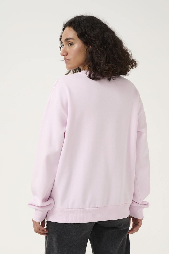 Back view of pink Sweat-Shirt Ellen, featuring a relaxed fit and long sleeves, perfect for casual outfits.