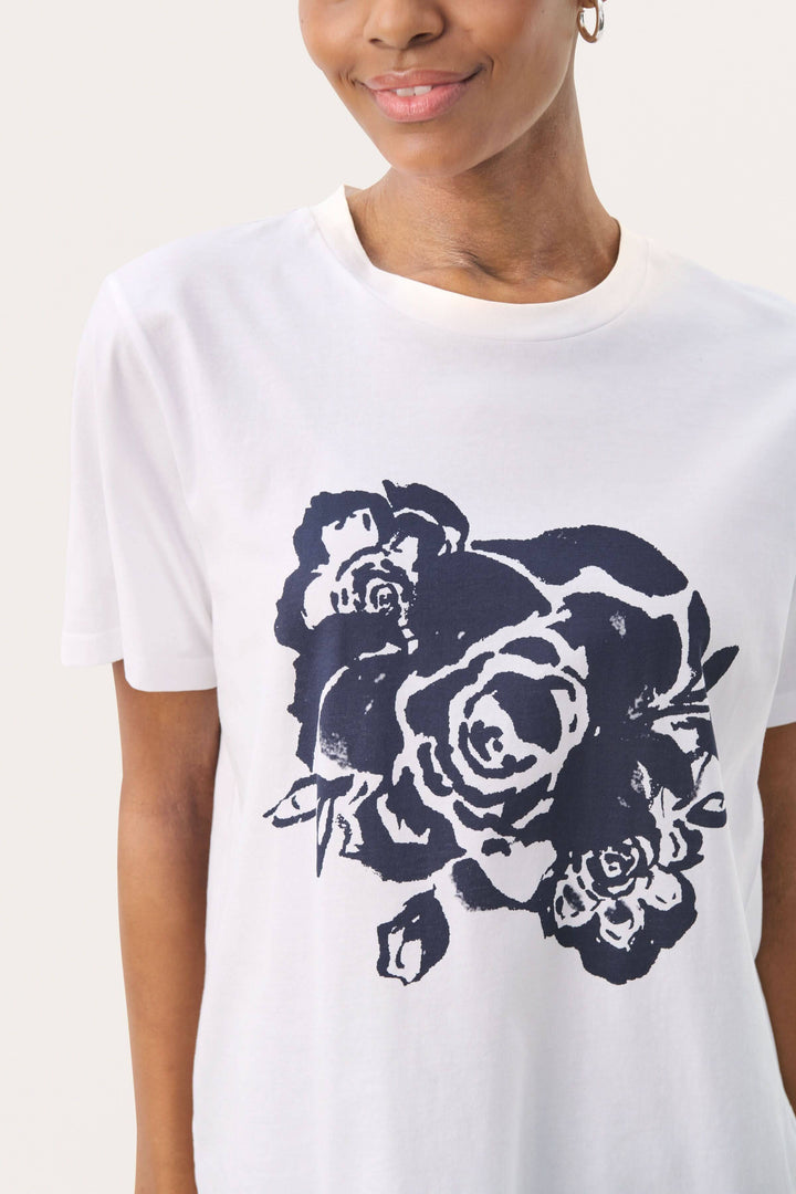T-shirt en coton bio avec imprimé floral audacieux, coupe confortable et manches courtes.