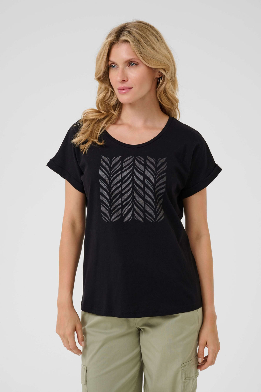 T-shirt Rigga noir en coton avec imprimé graphique feuillage, coupe ample et manches courtes retroussées.