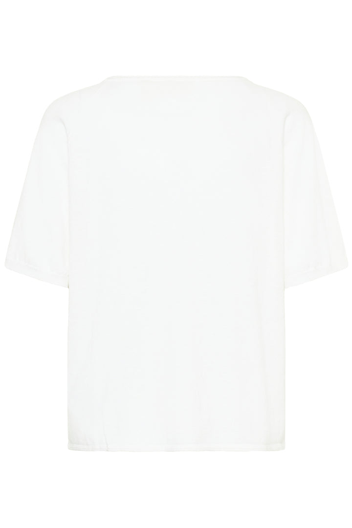 T-shirt Romane blanc coupe décontractée avec encolure en V et manches amples pour un style quotidien simple et féminin.