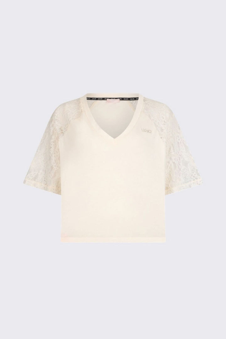 T-shirt à col en V avec manches en dentelle élégant, silhouette féminine raffinée, manches courtes en dentelle délicate, confort optimal.
