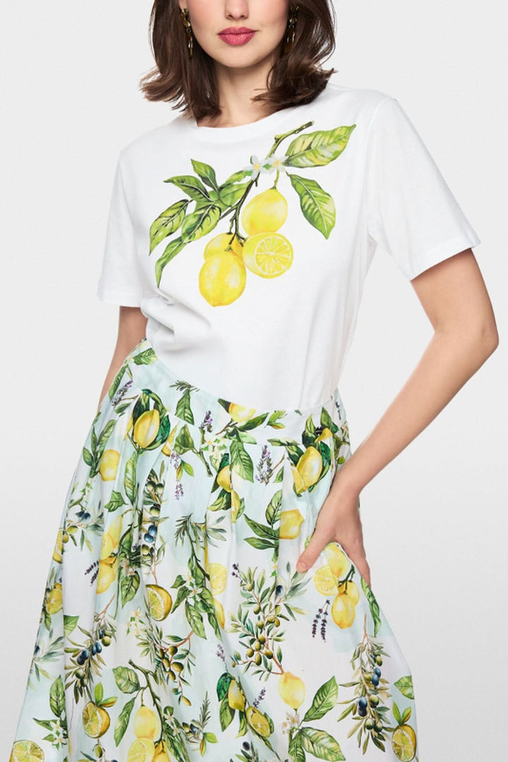 T-shirt imprimé citron en coton bio avec citrons, paillettes et perles, coupe ample, col rond, manches courtes.