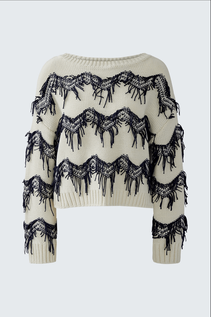 Tricot à motif zigzag avec franges, coupe carrée et encolure sous-marine, en coton pur.
