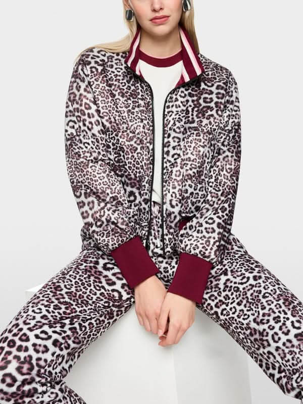 Veste bomber réversible avec imprimé léopard, poignets tricotés contrastés, fermeture éclair, idéale pour détente et style sportif.