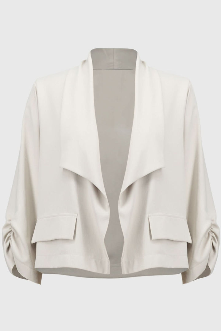 Veste col châle en crêpe souple avec poches, manches longues froncées, style décontracté et élégant.