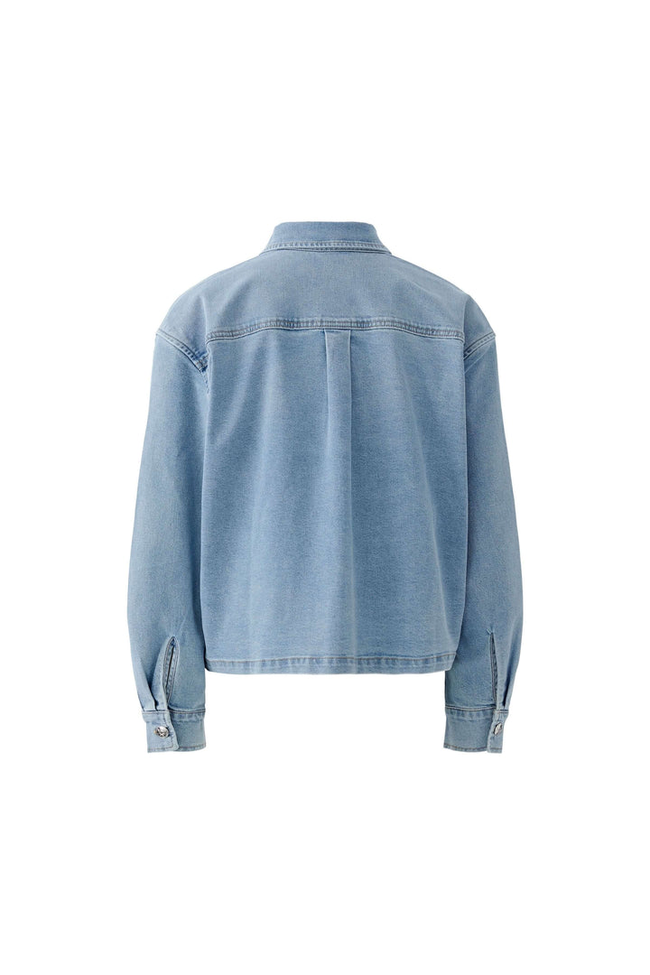 Veste en denim à coupe droite légèrement ample, vue de dos, idéale pour une tenue quotidienne moderne et décontractée.