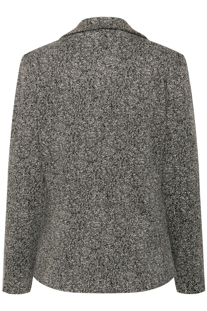 Veston Vineke noir et blanc, coupe structurée, reverse crantés, textile texturé et moderne.