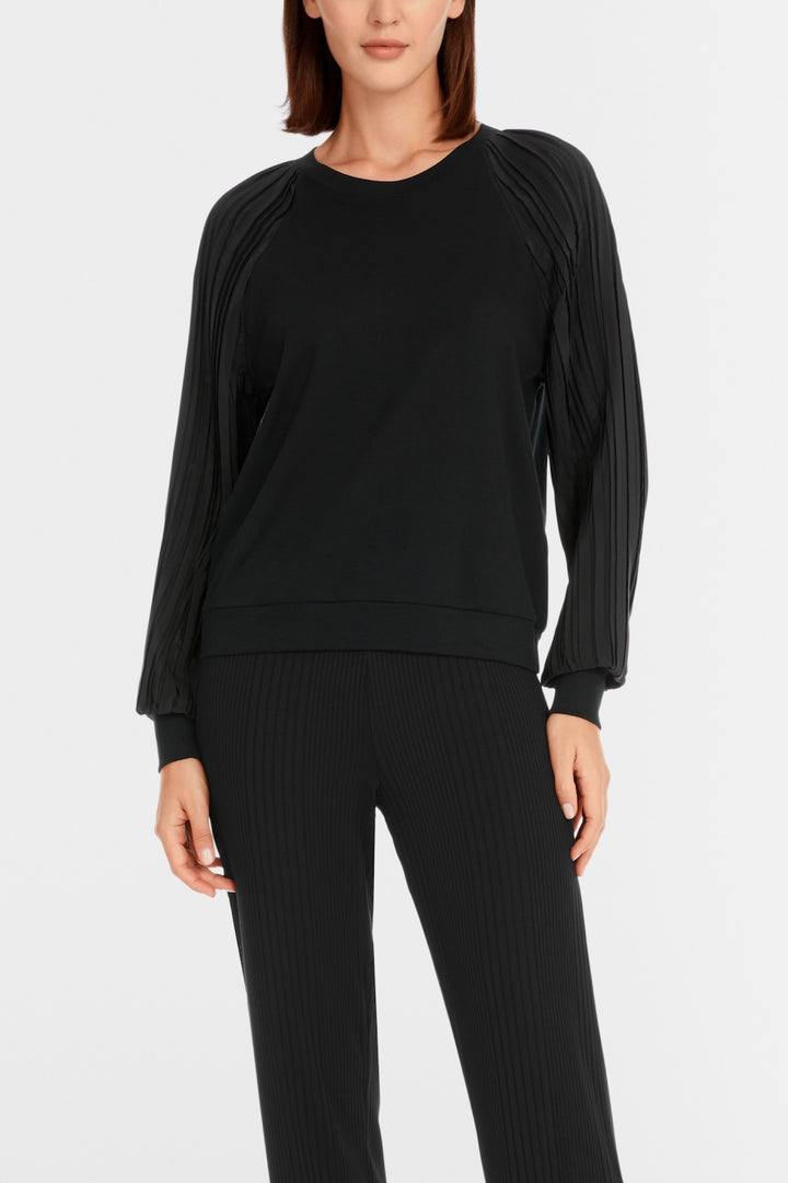 Blouse unie avec manches plissées