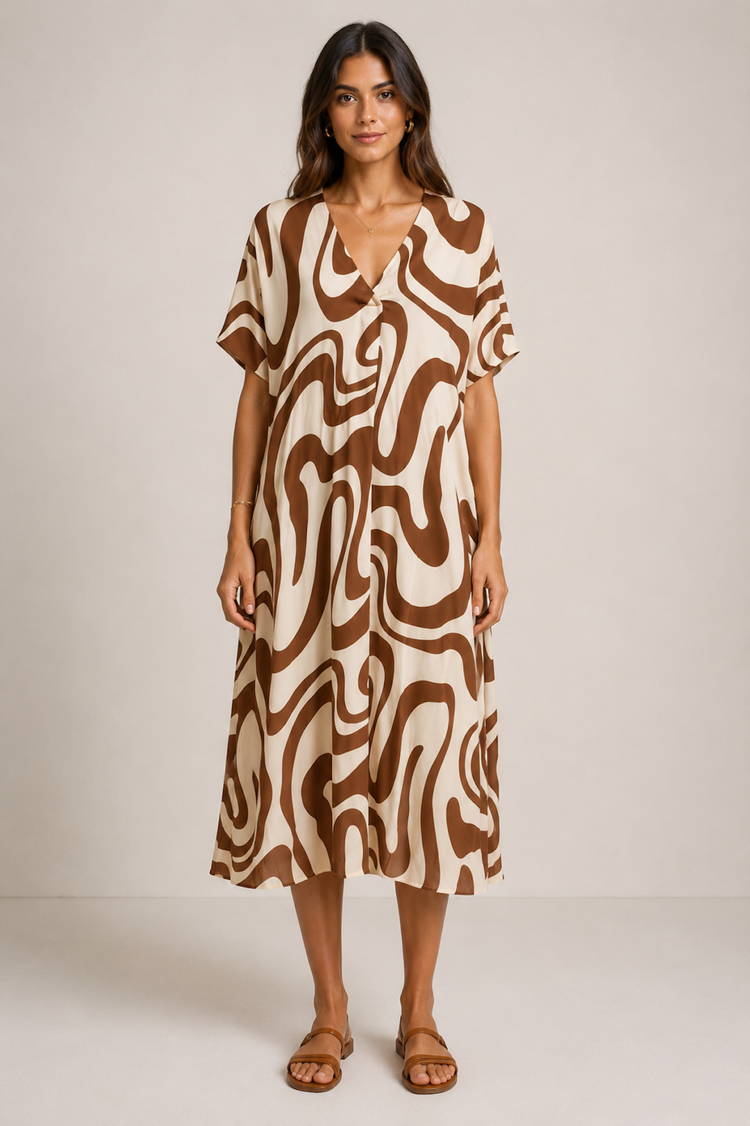 Flowing midi dress with an abstract pattern