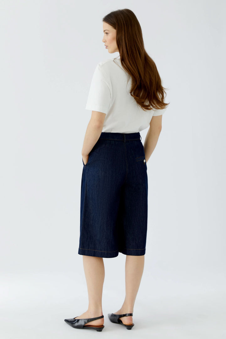 Women’s blue wide-leg denim Bermuda shorts, front view Oui