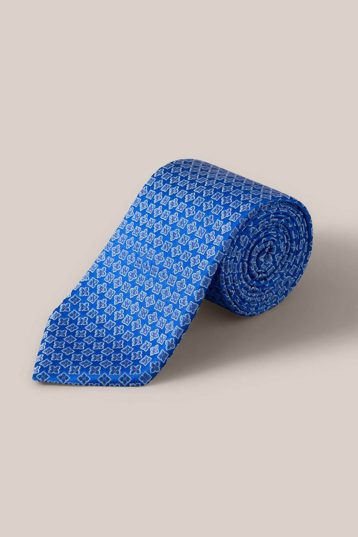 Blue geometric pattern silk tie