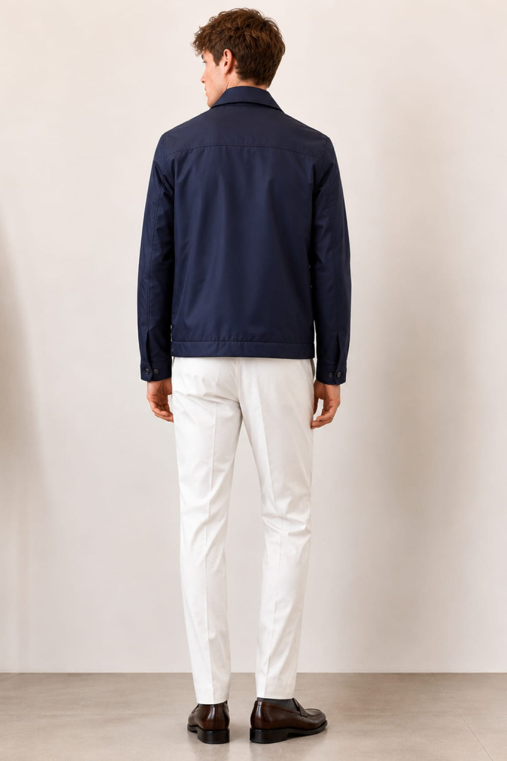 Vue de face blouson Corneliani pour homme gris clair avec fermeture éclair et col montant - Valérie Simon