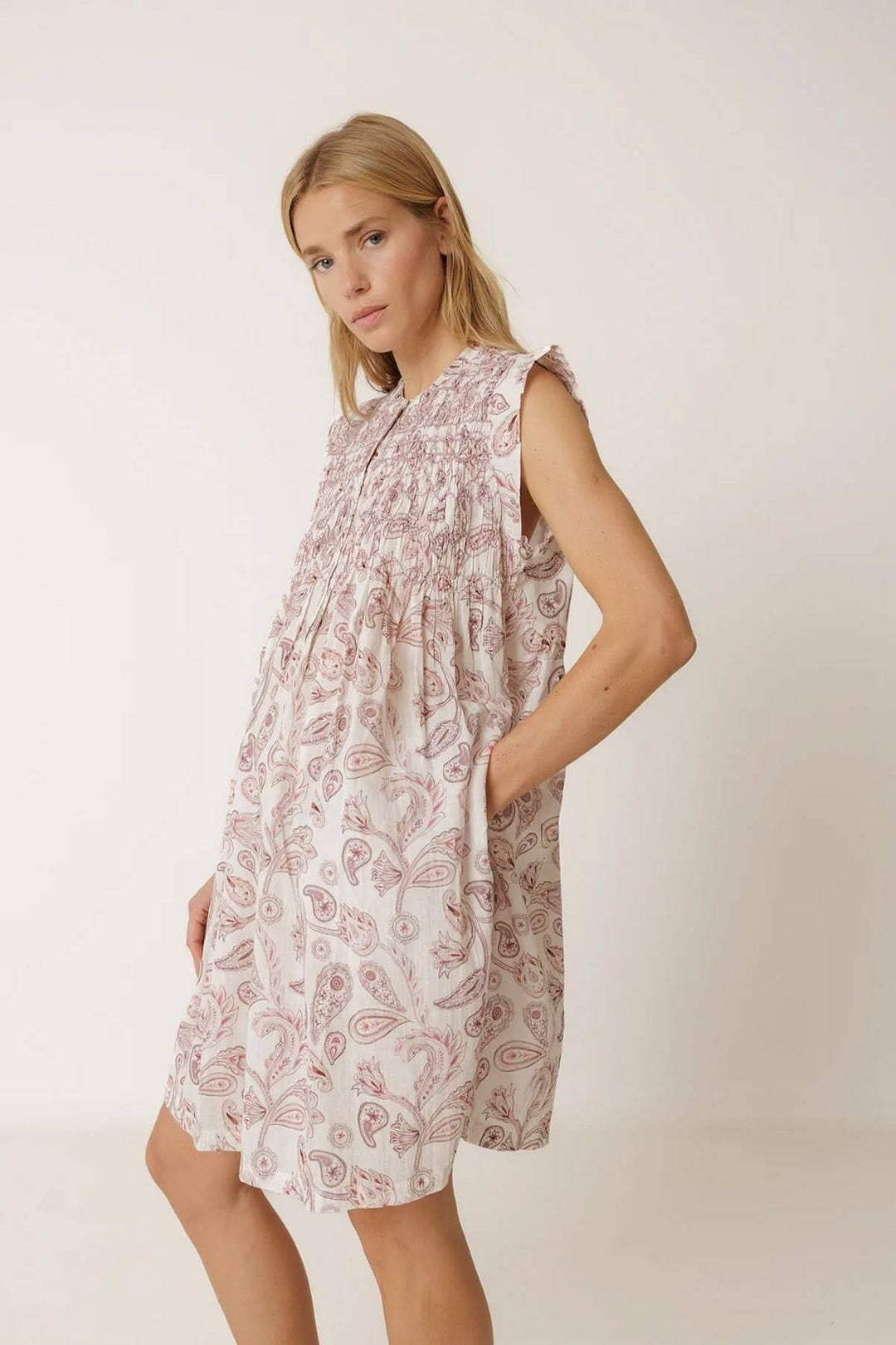 Short, flowing dress with a paisley print