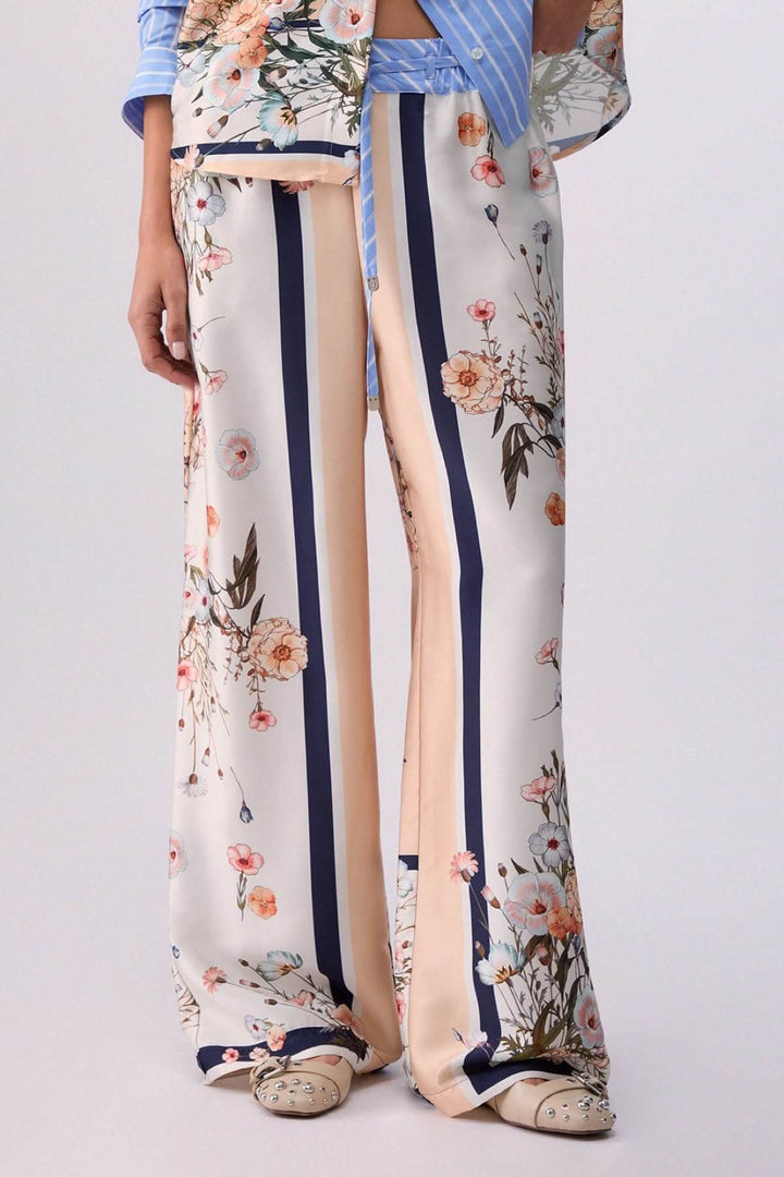 Pantalon fluide à motifs et rayures contrastées