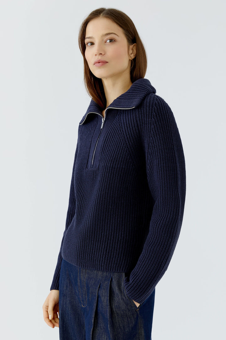 Chandail en tricot côtelé à col zippé vue de face pour femme Oui
