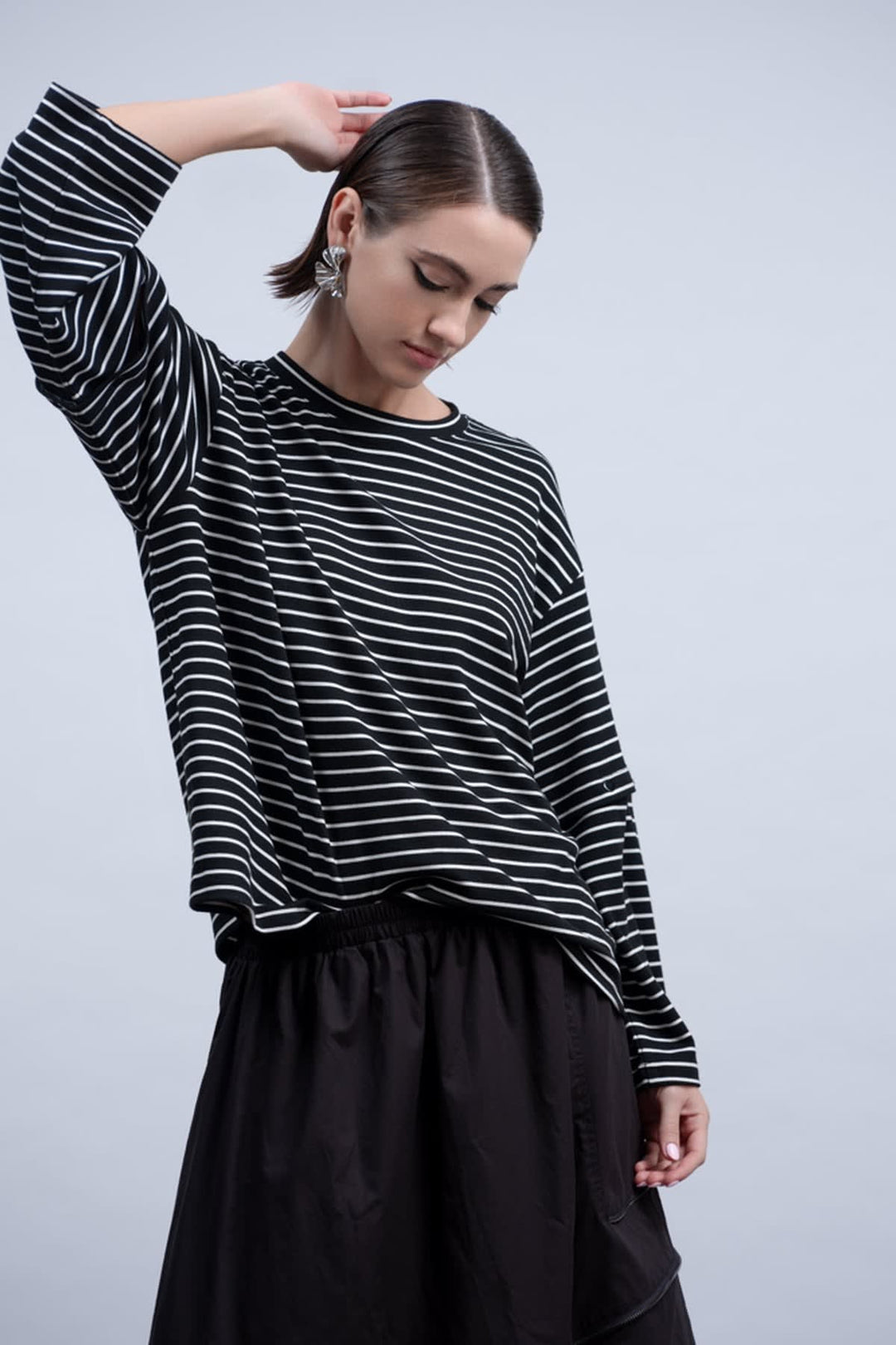 Front view of the Haako yellow and white striped women&