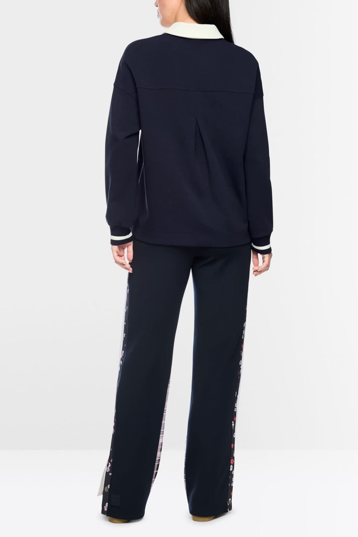 Chandail style polo à application florale brodée vue de face pour femme Marc Cain