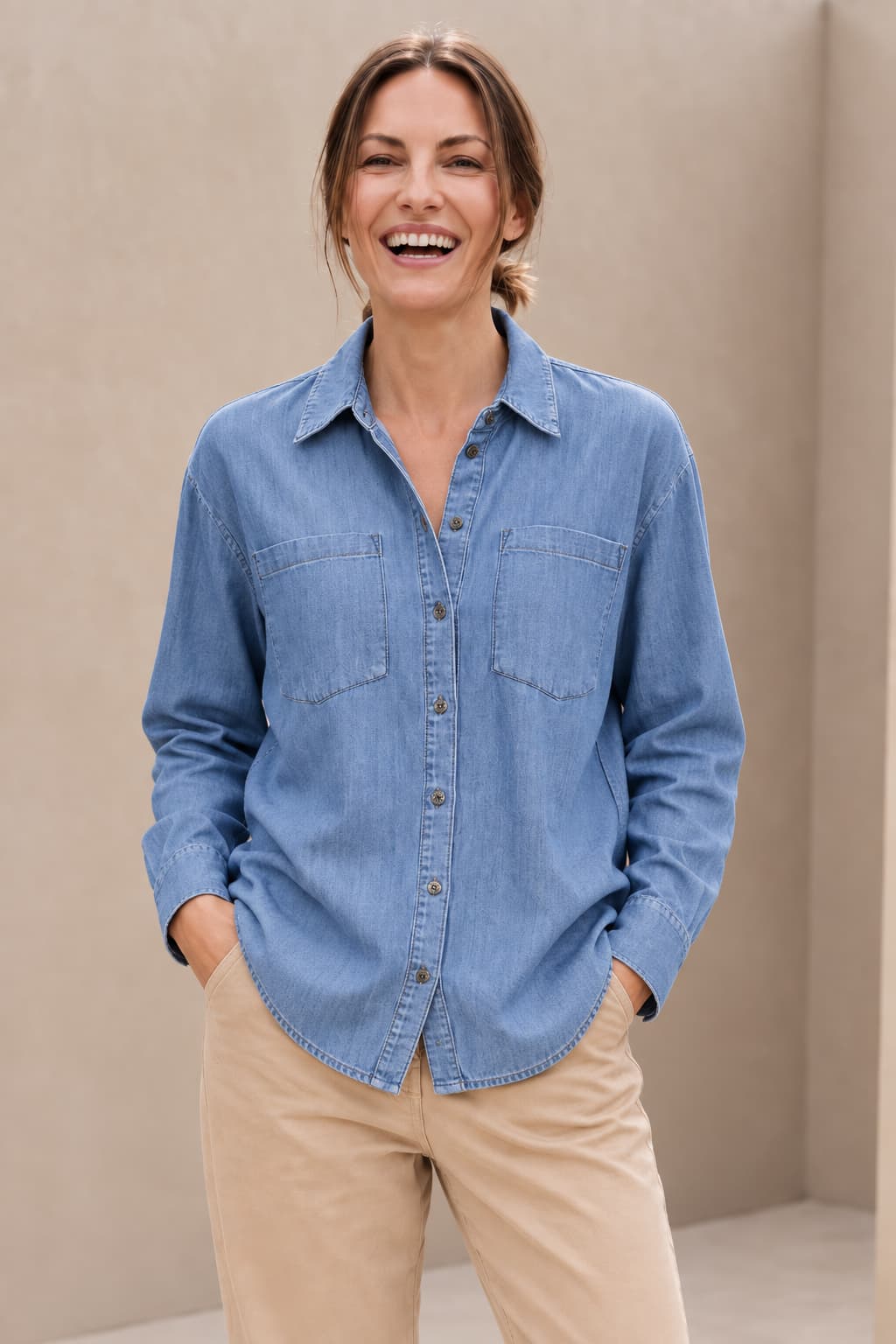 Blue denim shirt with patch pockets, front view, for women kennys