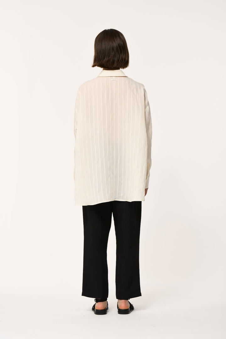 Side view of a blue striped women&