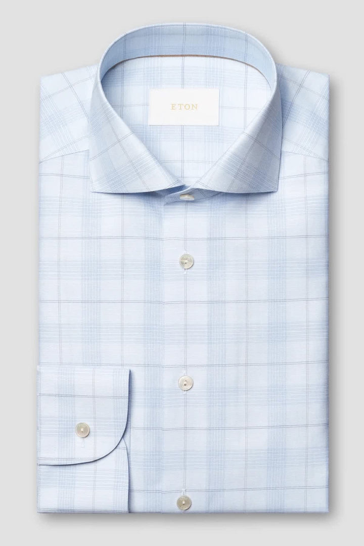 Front view of a subtle blue Eton checkered men&