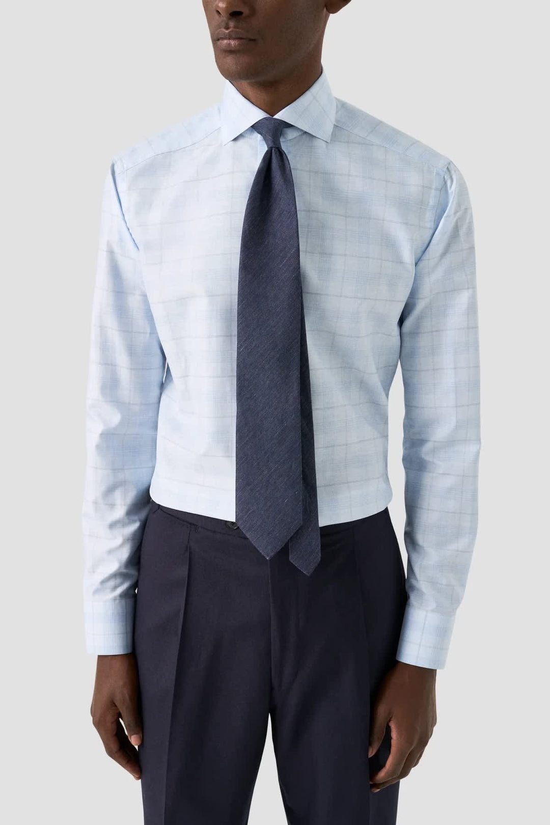 Front view of a subtle blue Eton checkered men&