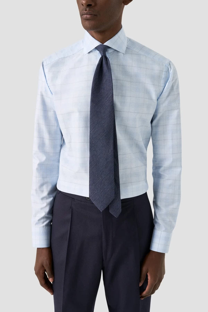 Front view of a subtle blue Eton checkered men&
