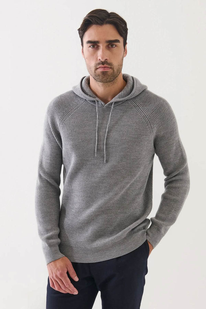 Chandail à capuche en laine mérinos extra-fine côtelée