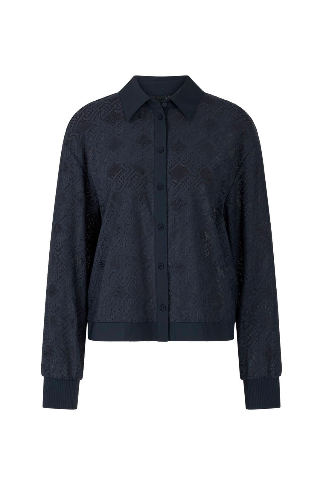 Chemise en dentelle ajourée, coupe décontractée, féminine et moderne, à porter avec jupe ou pantalon.